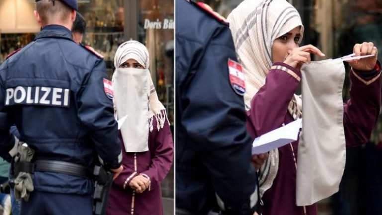 Gruaja myslimane detyrohet të zbuloj fytyrën nga policia austriake, pasi në këtë vend ka hyrë në fuqi ligji që ndalon bartjen e mbulesës në vende publike (Foto)