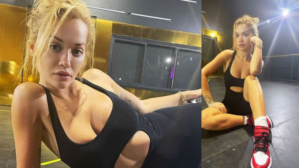 Rita Ora pozon me veshje sportive ngjyrë të zezë teksa shfaqet pa makijazh