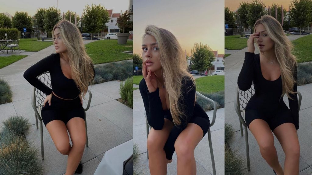 Kanita publikon fotografi atraktive e veshur me fustan elegant me ngjyrë të zezë