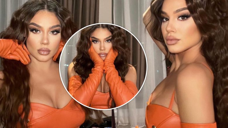 Dhurata Dora mahnit me dukjen në një kostum portokalli